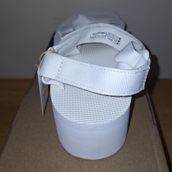 A pair of Teva W. Flatform Universal sandals in solid white in a ladies Size 9. - Picture 5 of 10